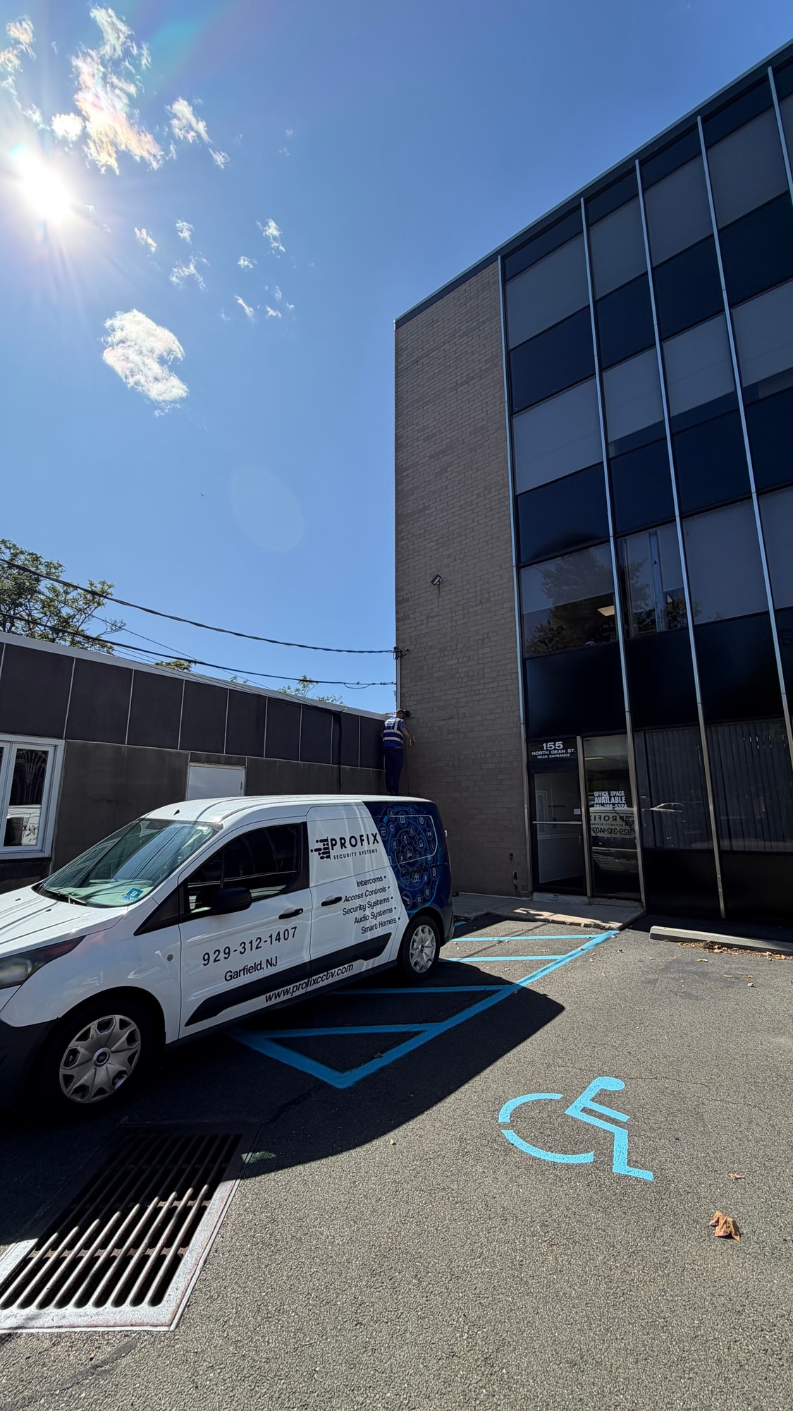 Profix Security Systems service van outside a commercial property in New Jersey for a professional security installation.