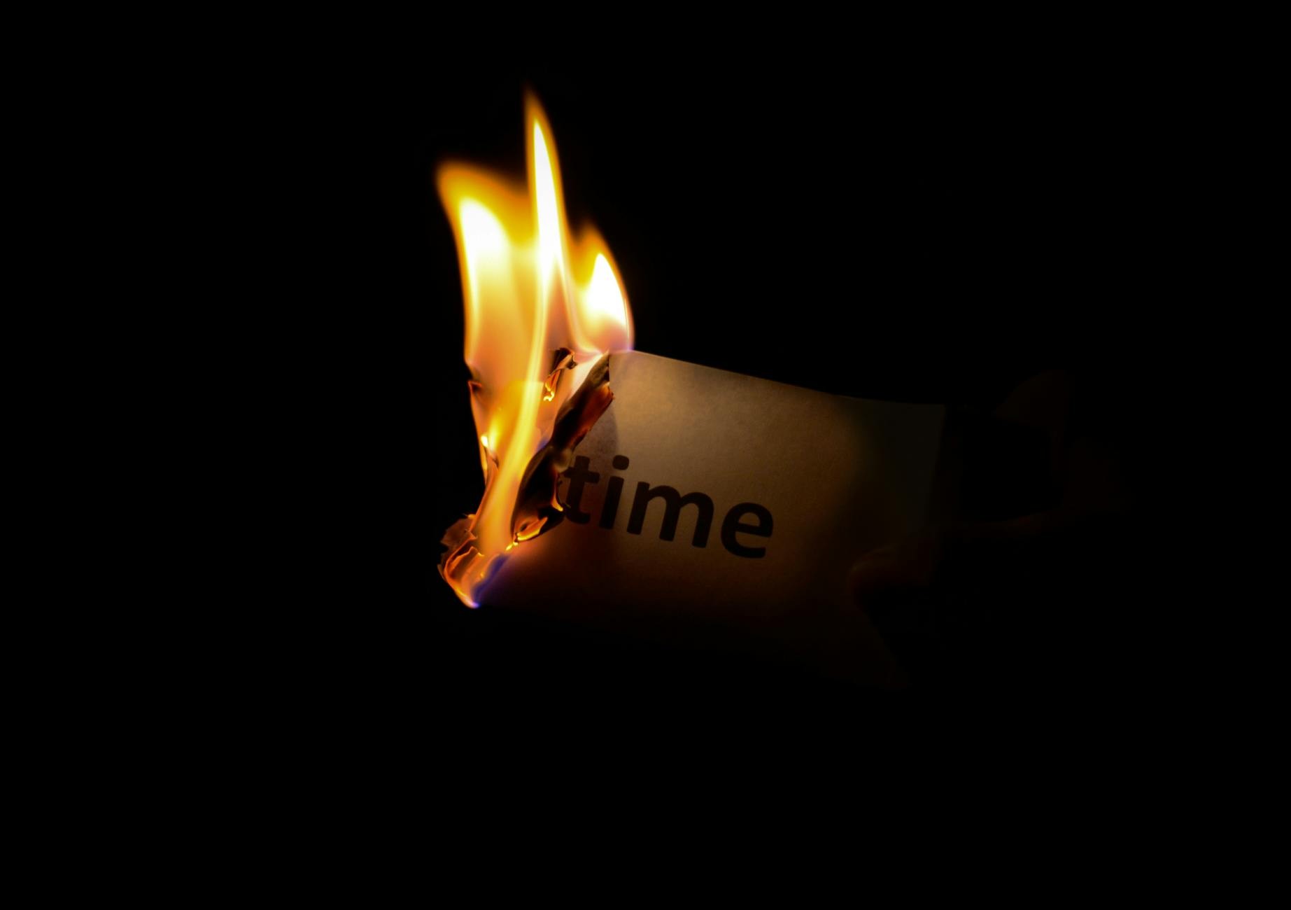A lit matchstick symbolizing urgent HR risk or crisis.